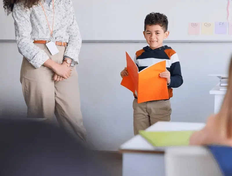 A child taking part in a classroom learning activity